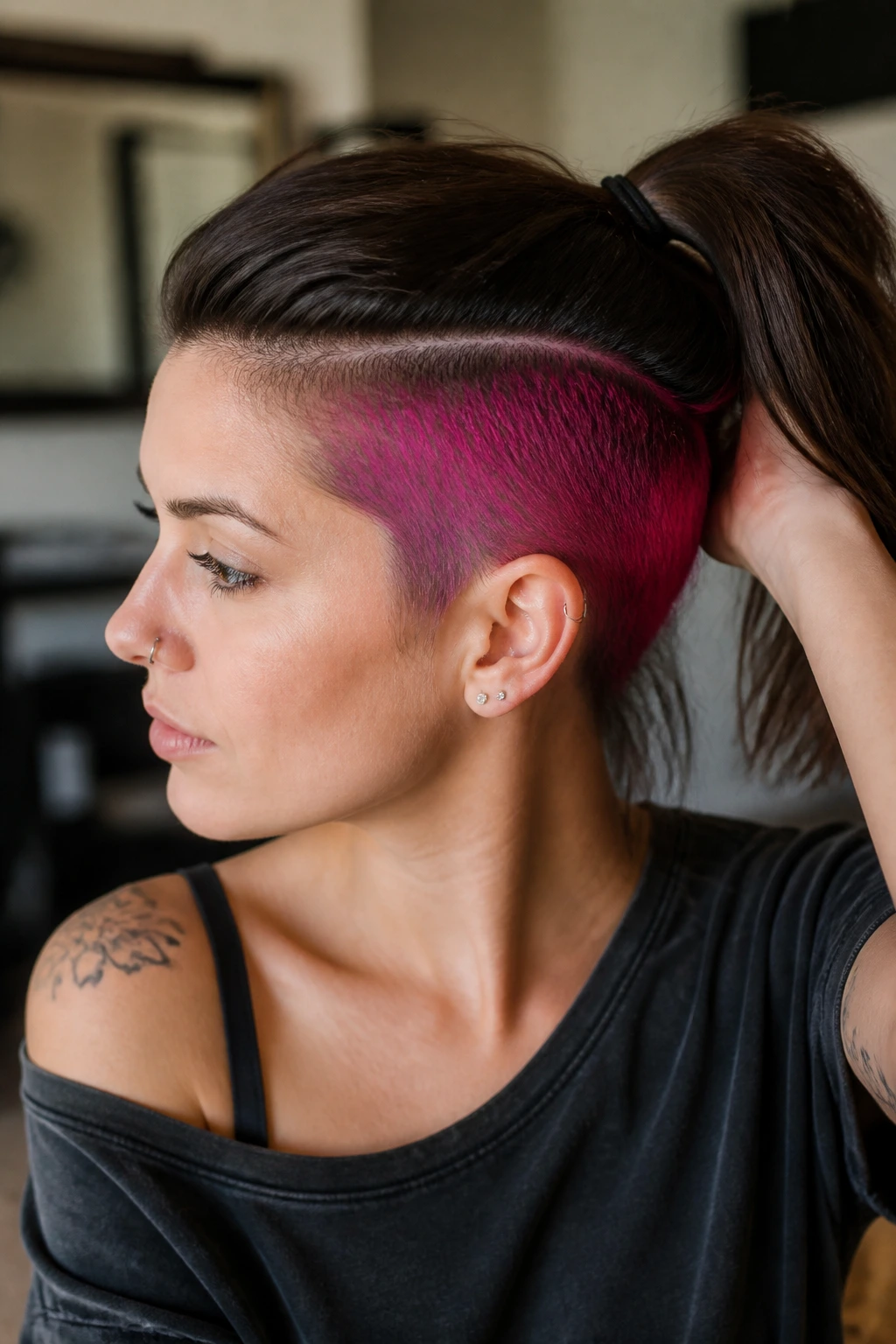 Close-up of real person with peekaboo color undercut peeking through hair