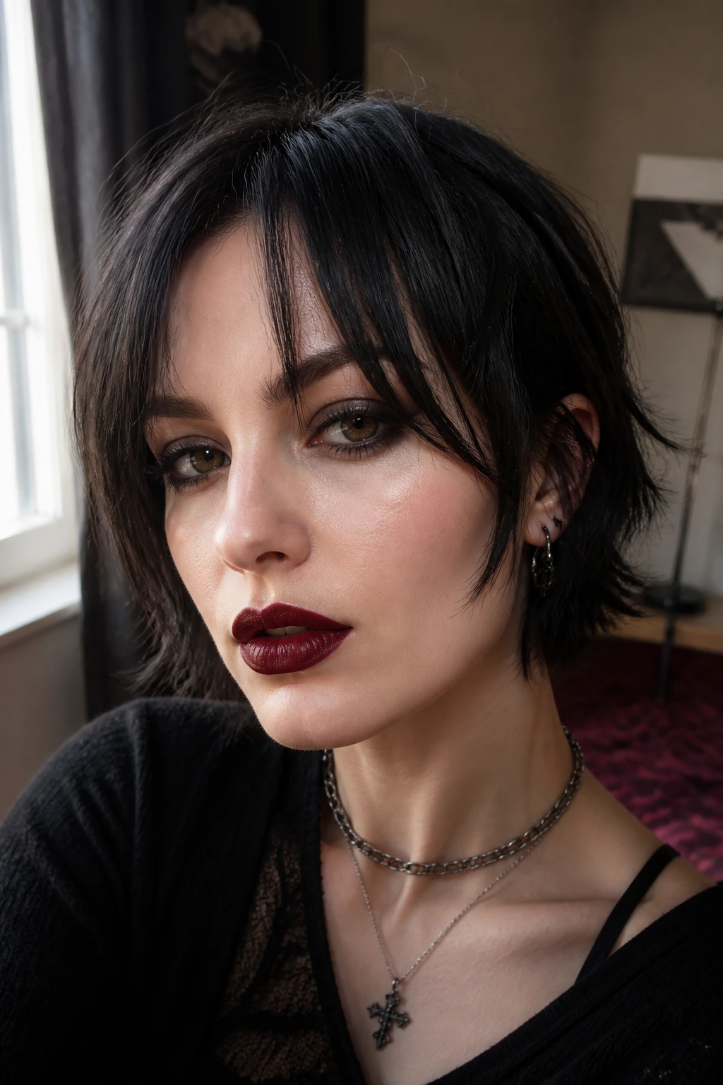 Close-up of a real woman with piecey split curtain bangs in a short goth hairstyle