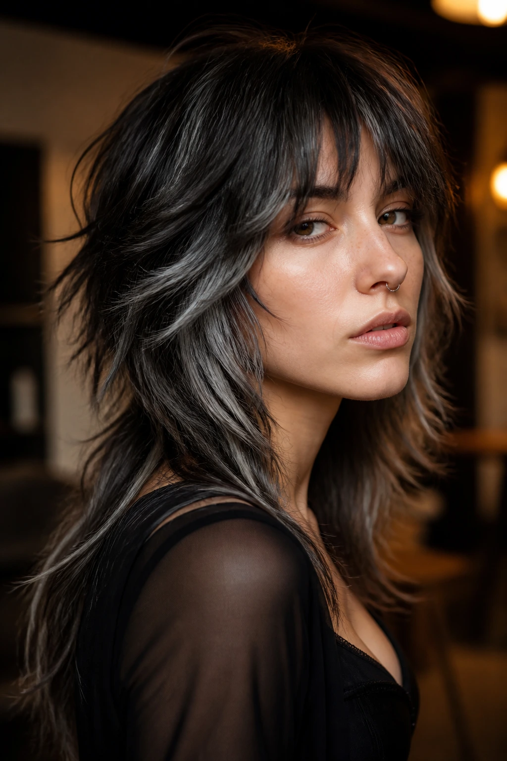 Close-up portrait of real person with razor-cut wolf cut and silver smoke streaks