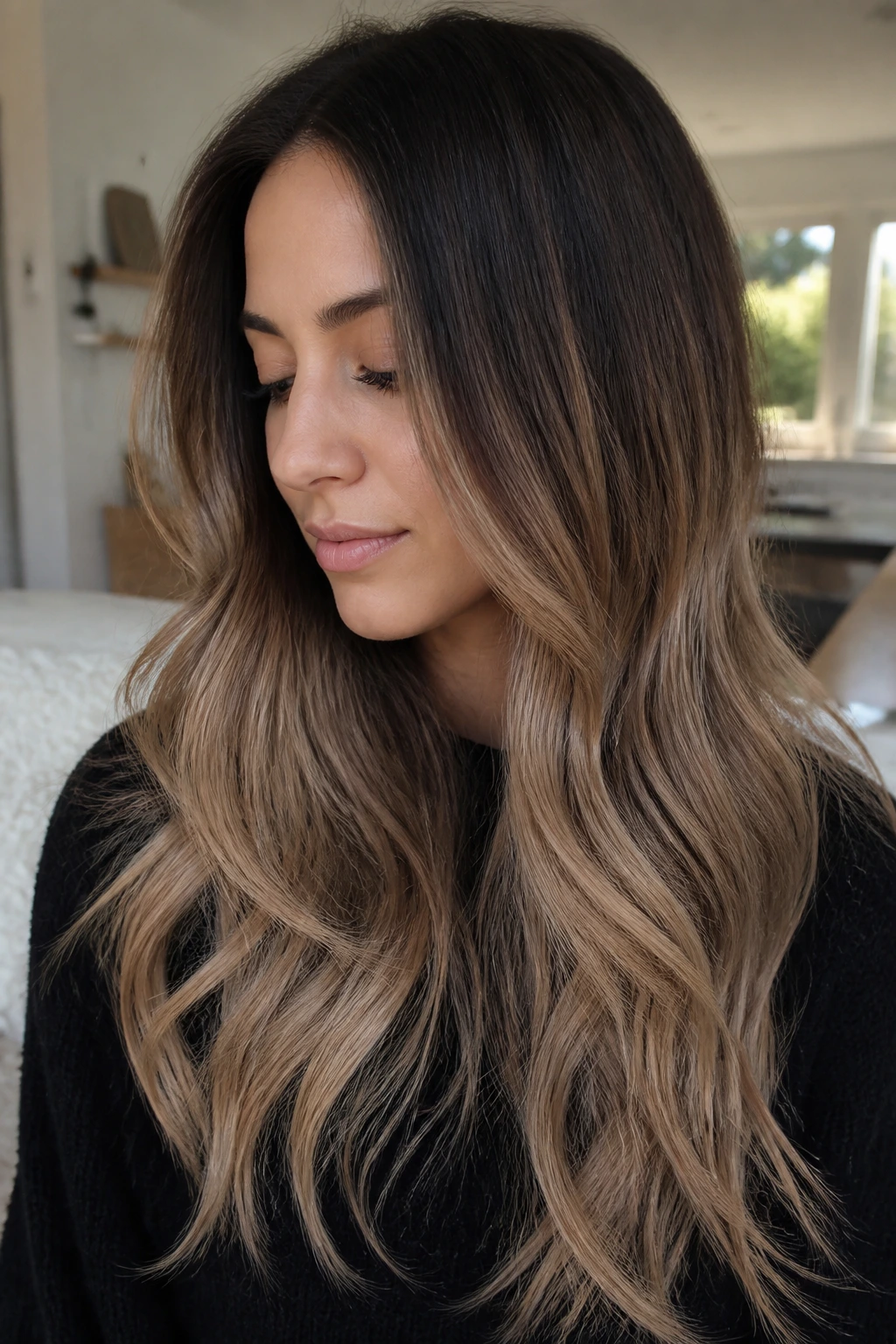 Brunette with rooty beige ombré on long hair