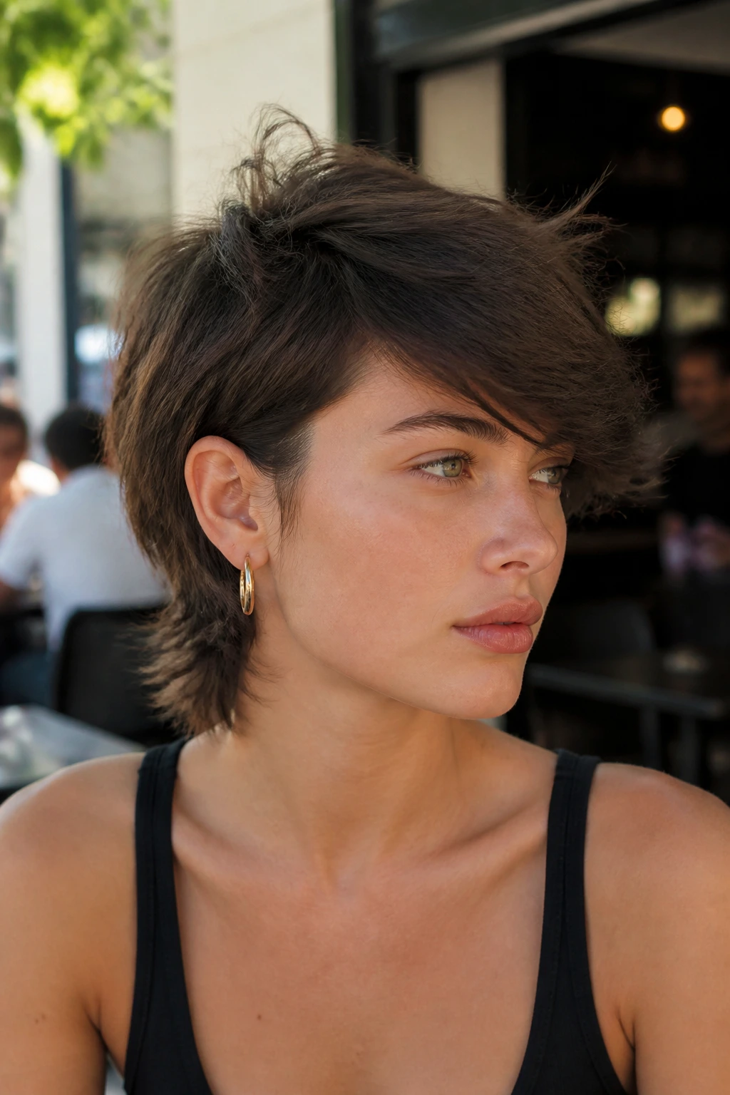 Real person portrait showing a deep side part and side-swept fringe mullet look