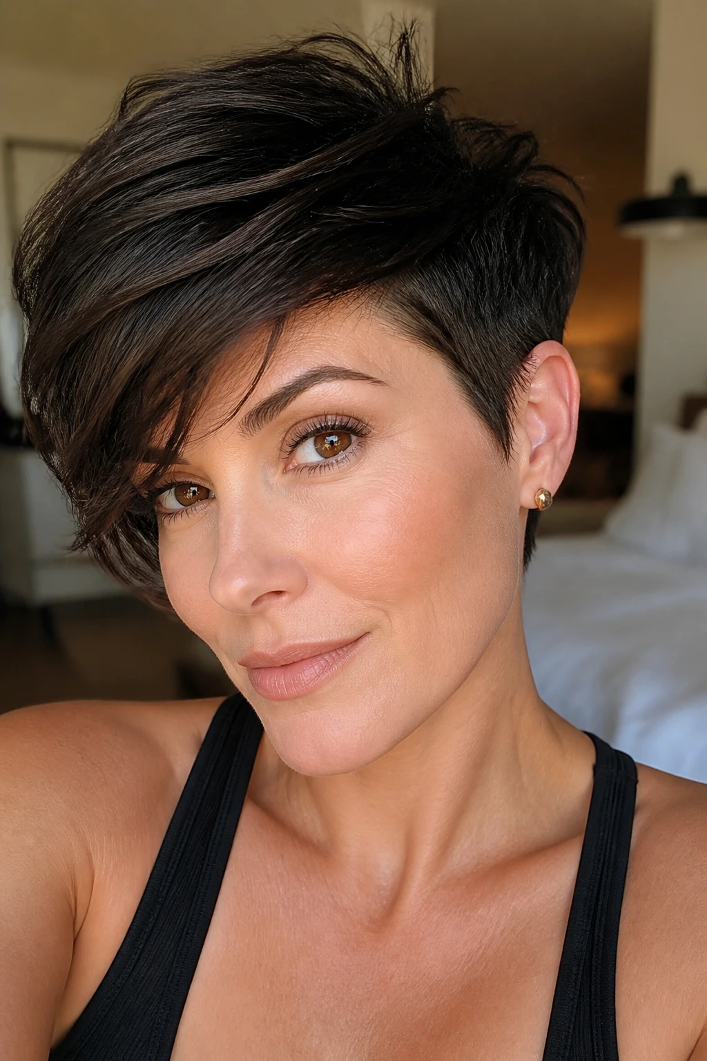 Close-up portrait of a real woman with Side-Swept Pixie on thick hair