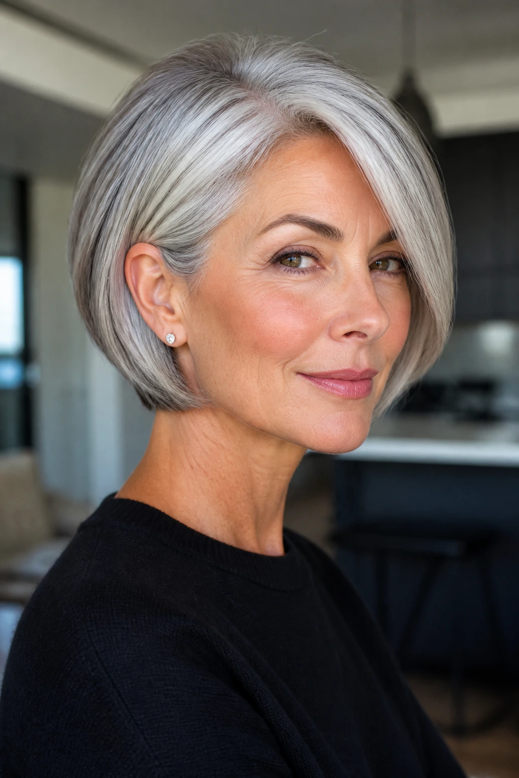 Close-up of a real woman with silver gloss stacked bob
