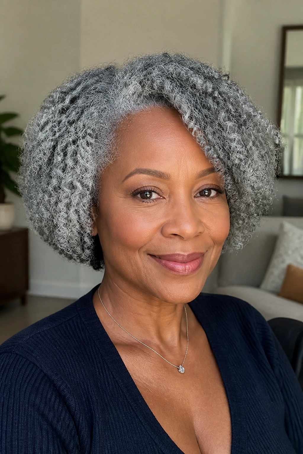 Close-up of a real woman with silver twist-out bob hairstyle.