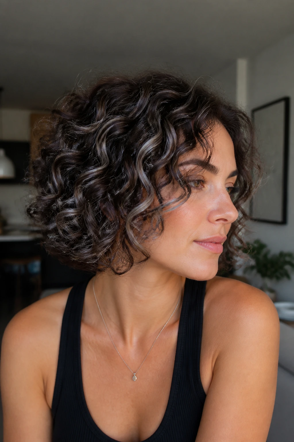 Curly hair with smoky silver ribbons on a real person