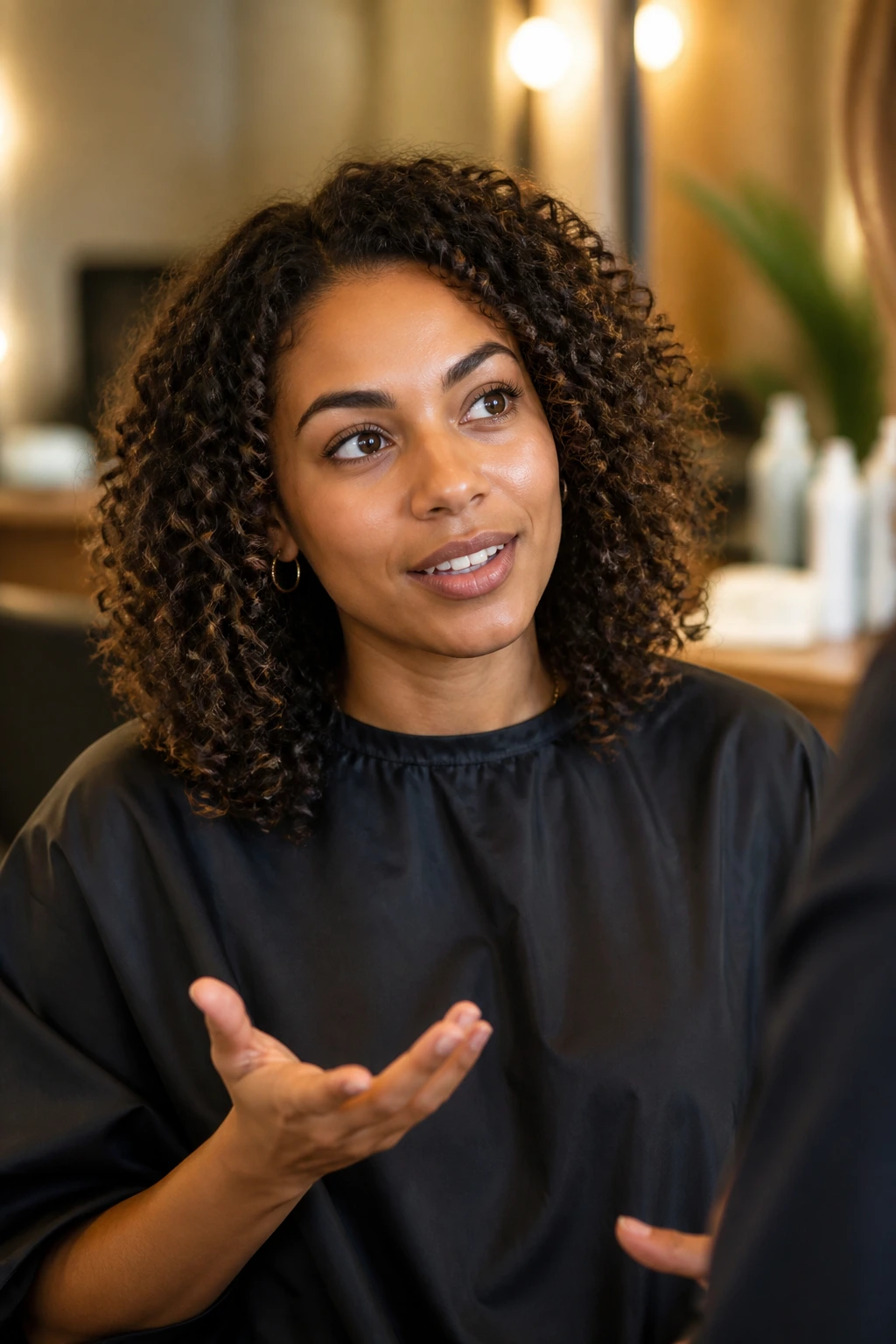 Real person in salon chair discussing haircut details