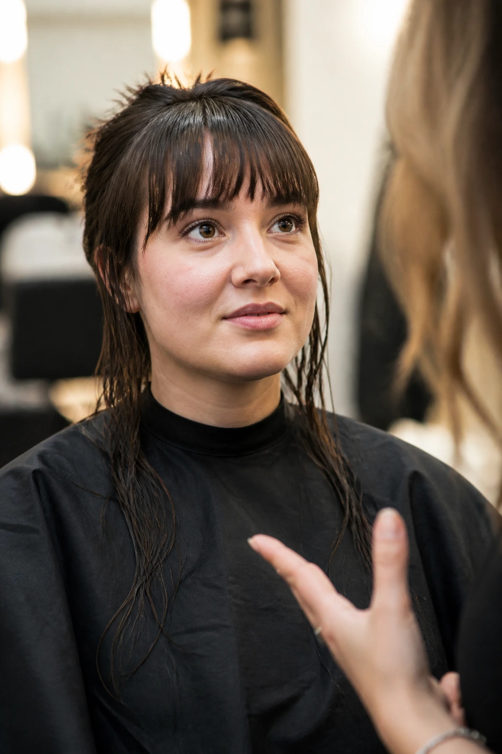 Close-up of a real person in a salon chair ready for the first haircut