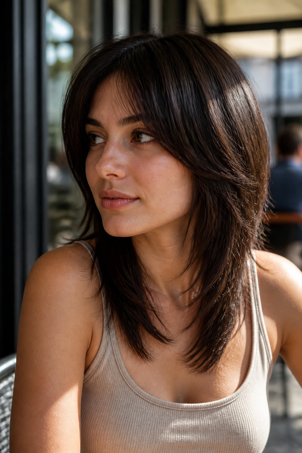 Close-up of a real person with tapered-ends shag showing lighter bottom.