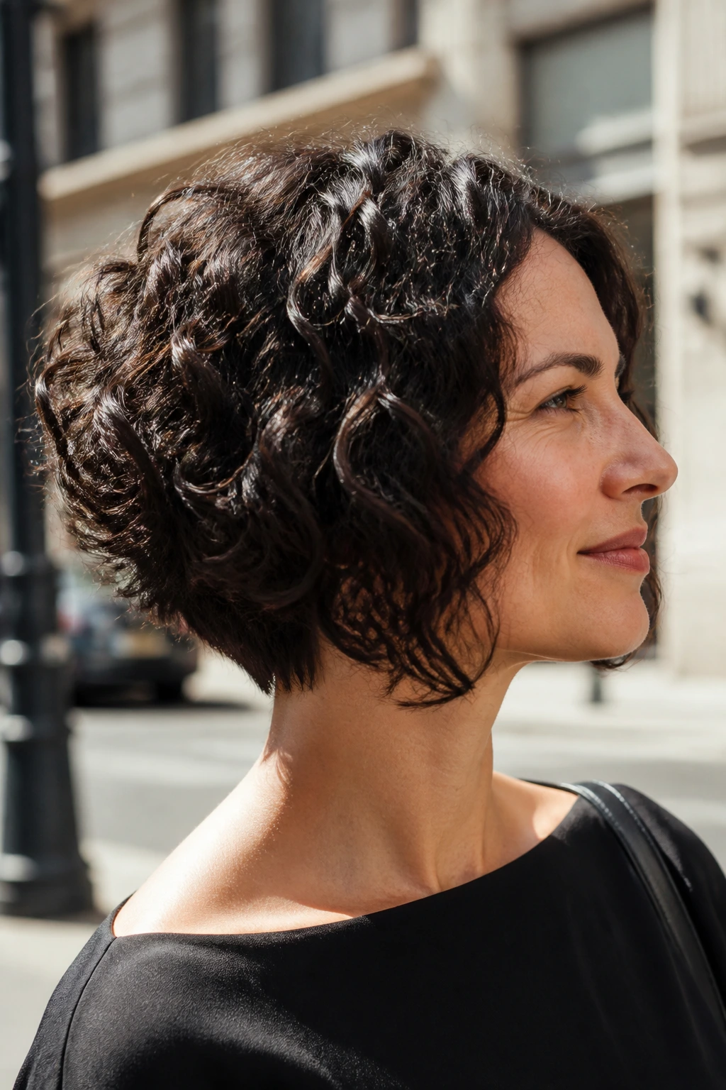 Close-up portrait of a real woman with a tapered neckline lob