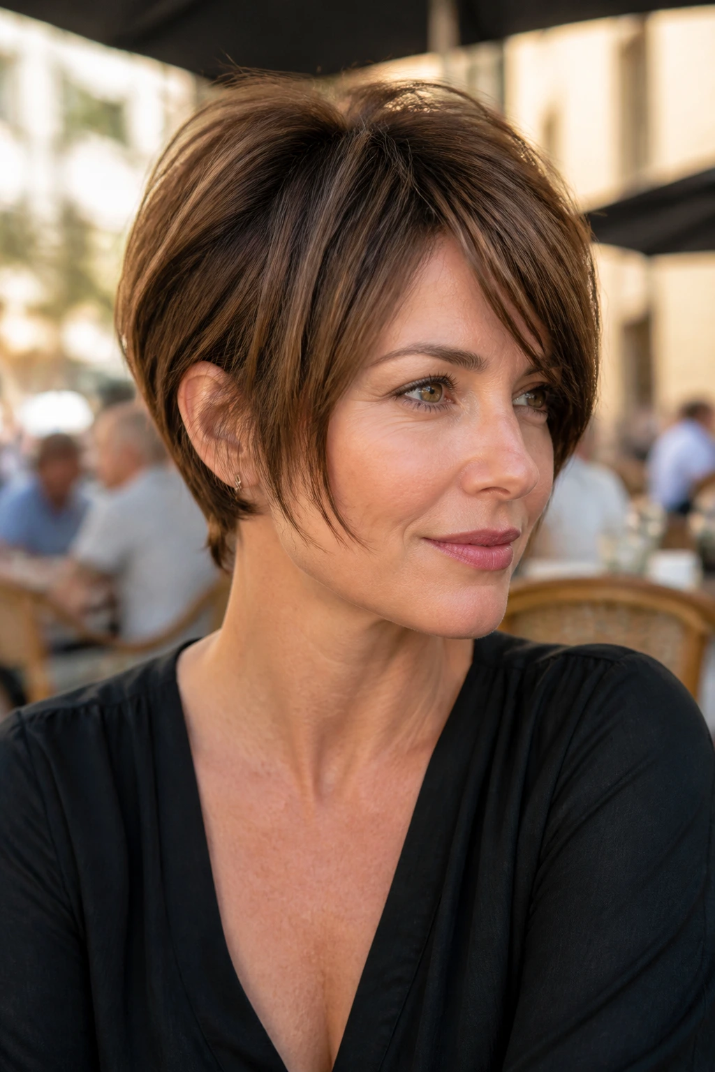 Temple-length pixie close-up portrait on a real woman