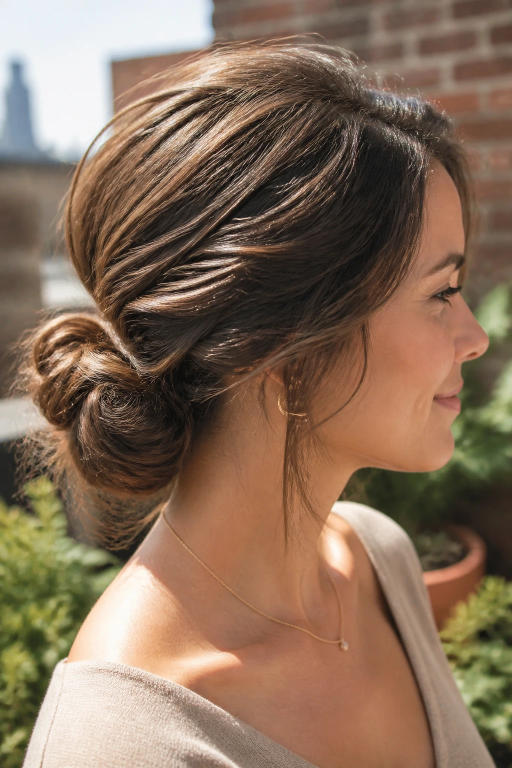 Close-up of a textured matte chignon with flyaways