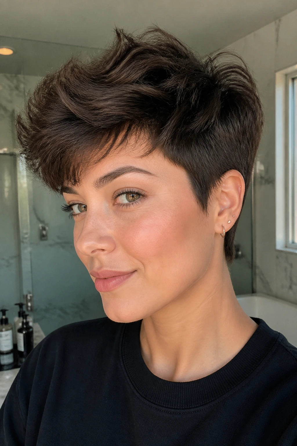 Real person with textured pixie and long top, showing lift