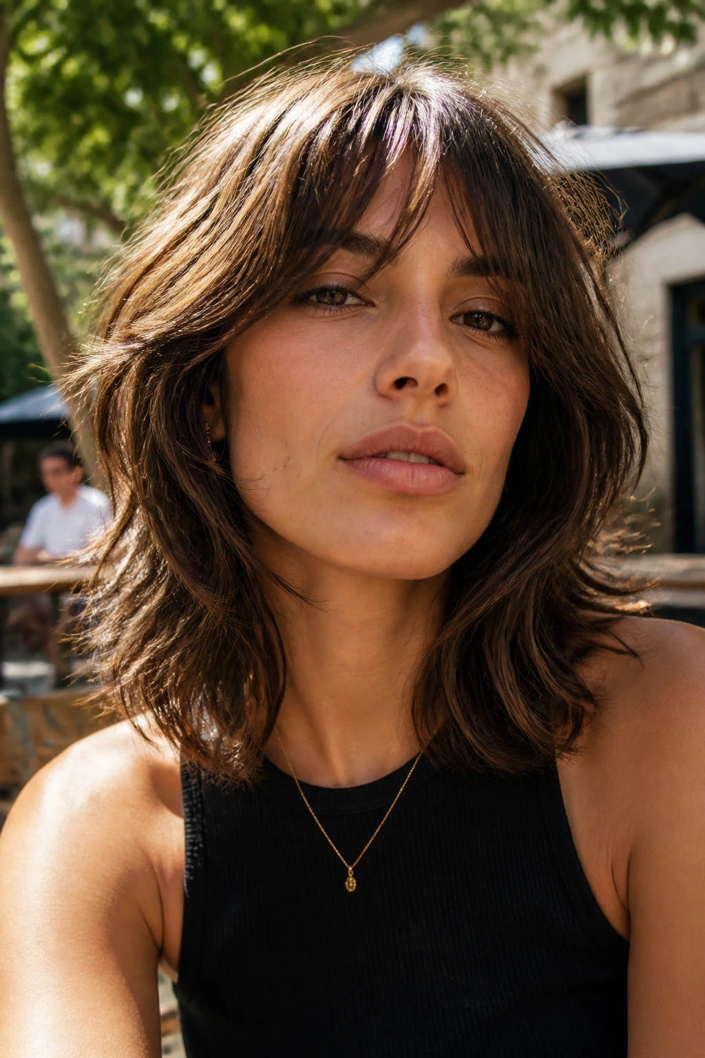 Textured shag with airy ends on a real person, shoulder-length hair
