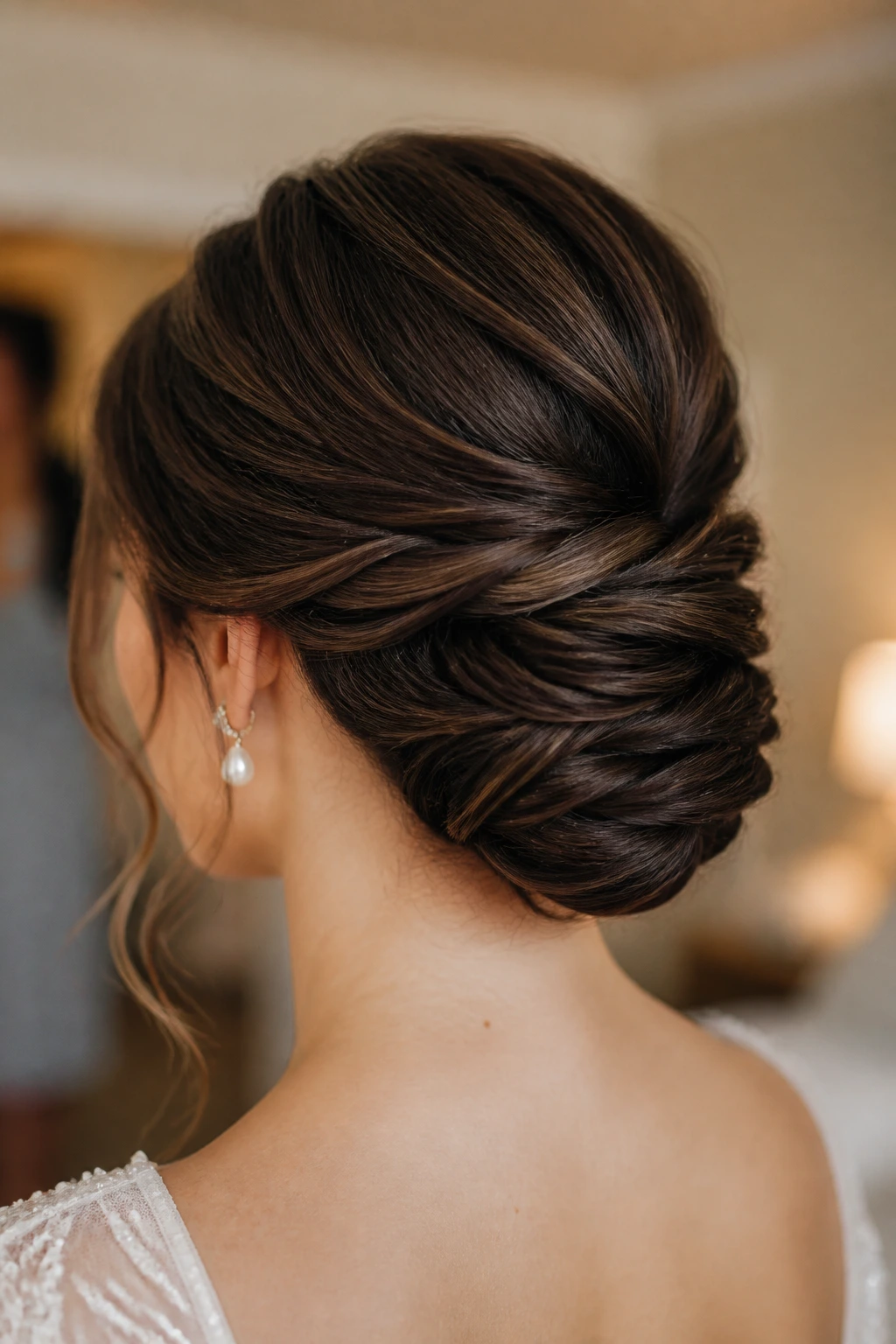 Real bride showing a layered, stacked chignon for thick hair at the nape.