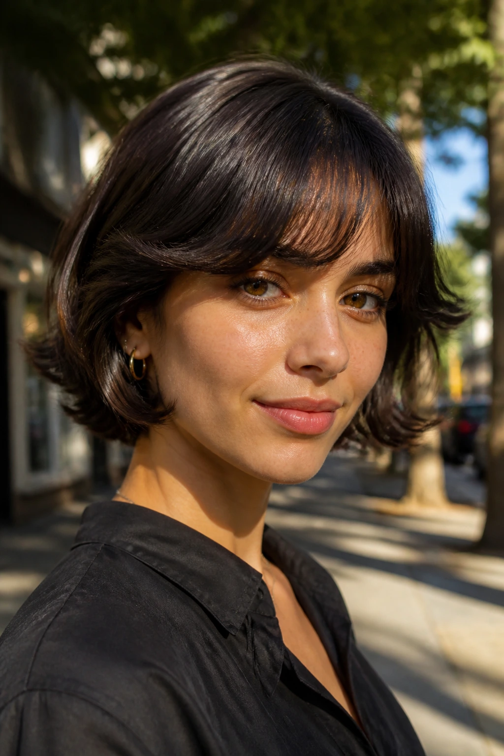Real woman with thick hair feathered fringe on a sunny street
