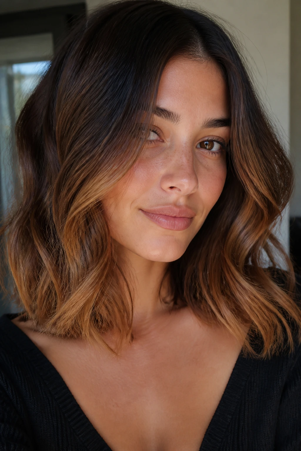 Close-up portrait of a woman with toasted chestnut ombre showing depth of color