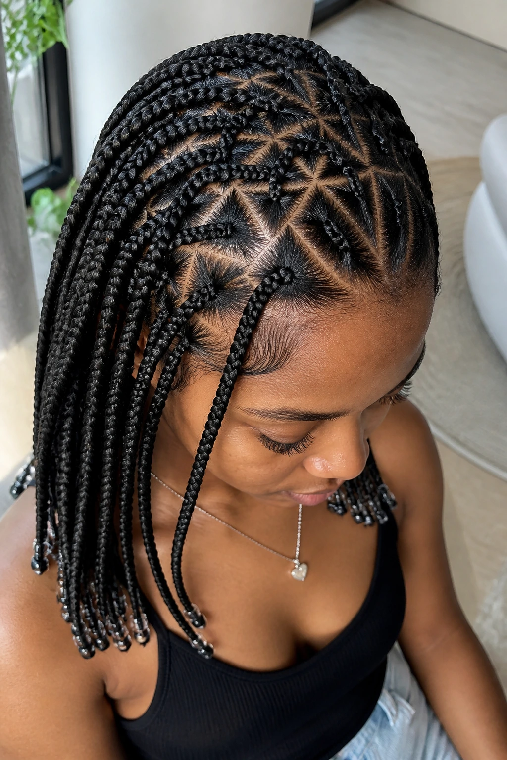 Triangle-part knotless braids showing geometric parts with bead ends
