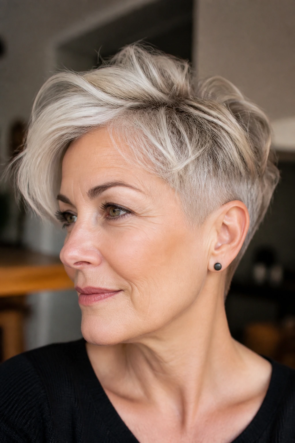 Close-up of a real woman with a tapered undercut pixie hairstyle