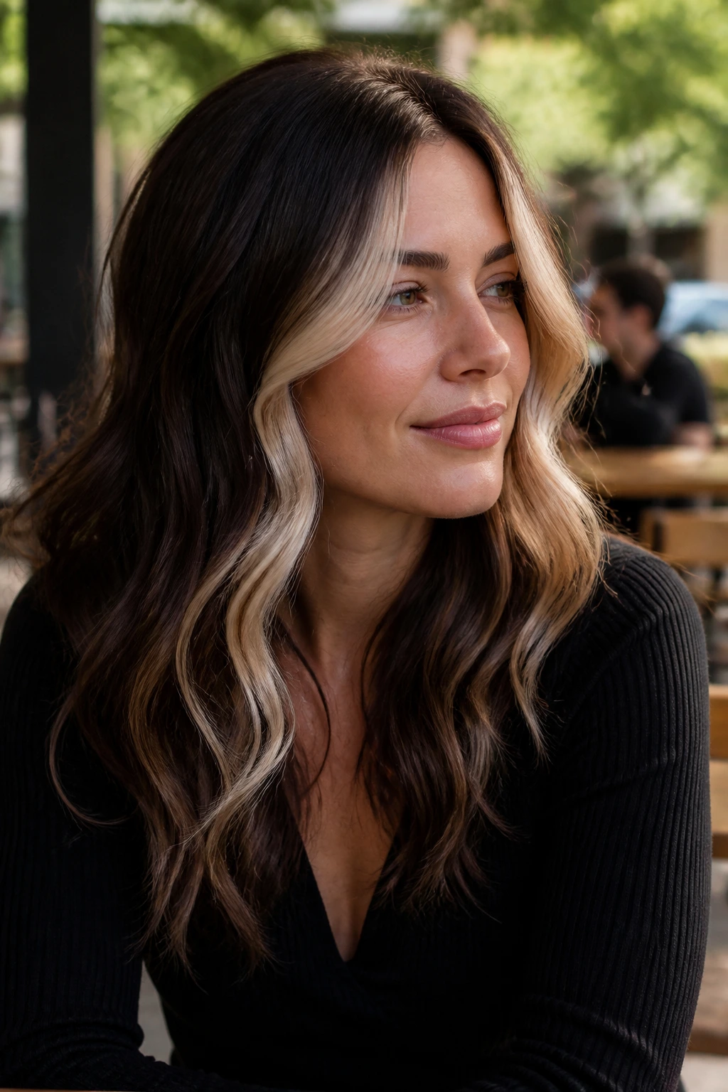 Close-up of woman with vanilla blonde front piece on deep brunette base