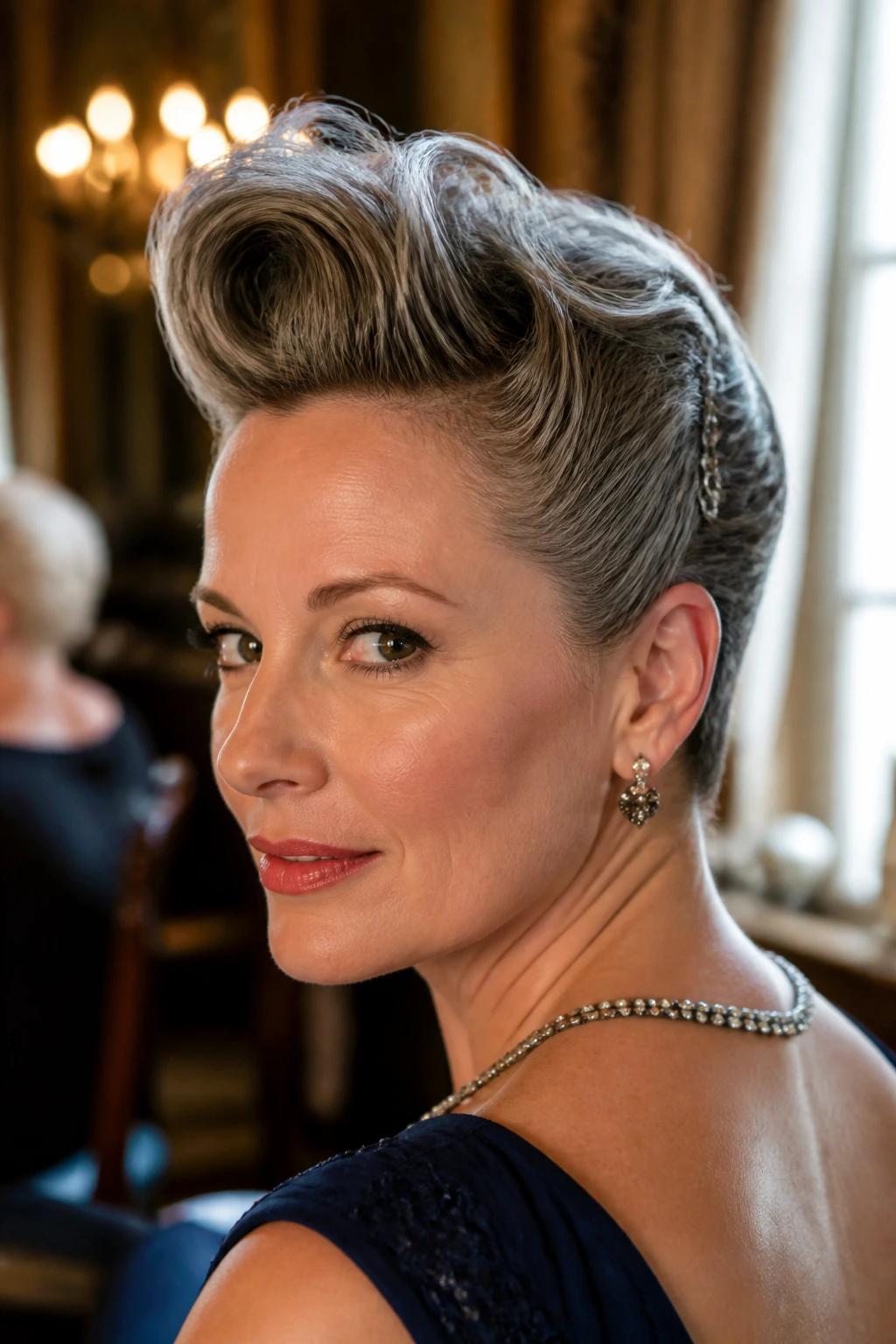 Portrait of a woman with Victory-Roll Crown Pixie showing a high crown roll.