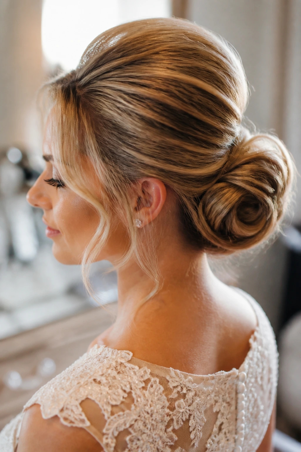 Real bride close-up with voluminous crown-lift bun and low nape bun