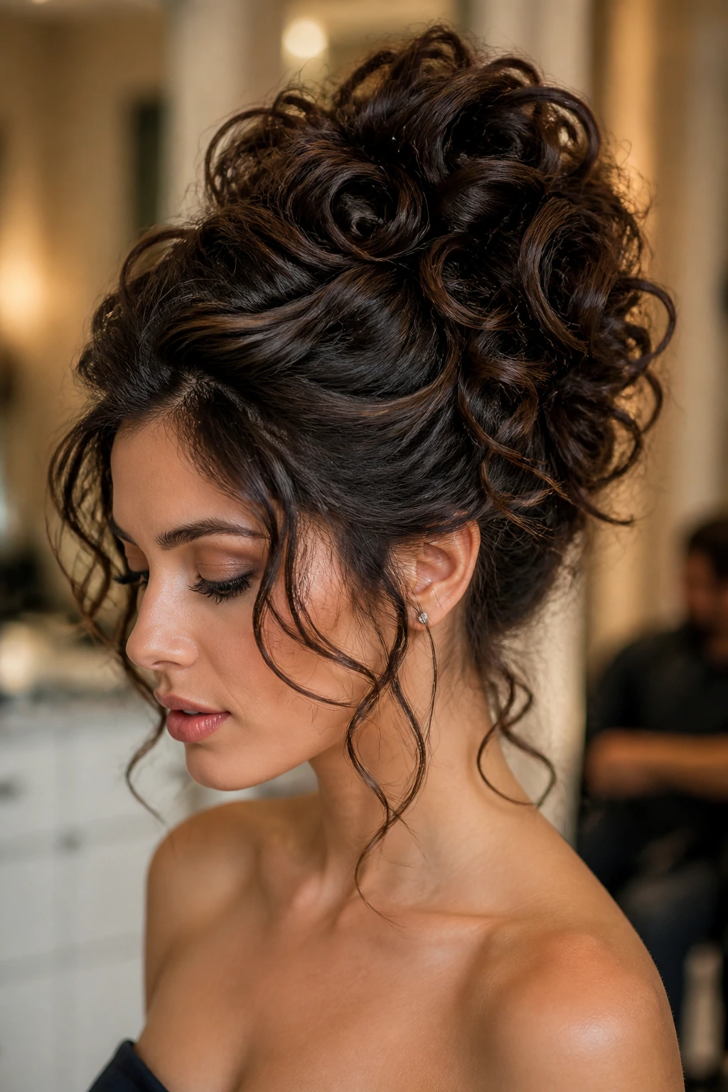 Close-up of a real woman with a voluminous curly updo