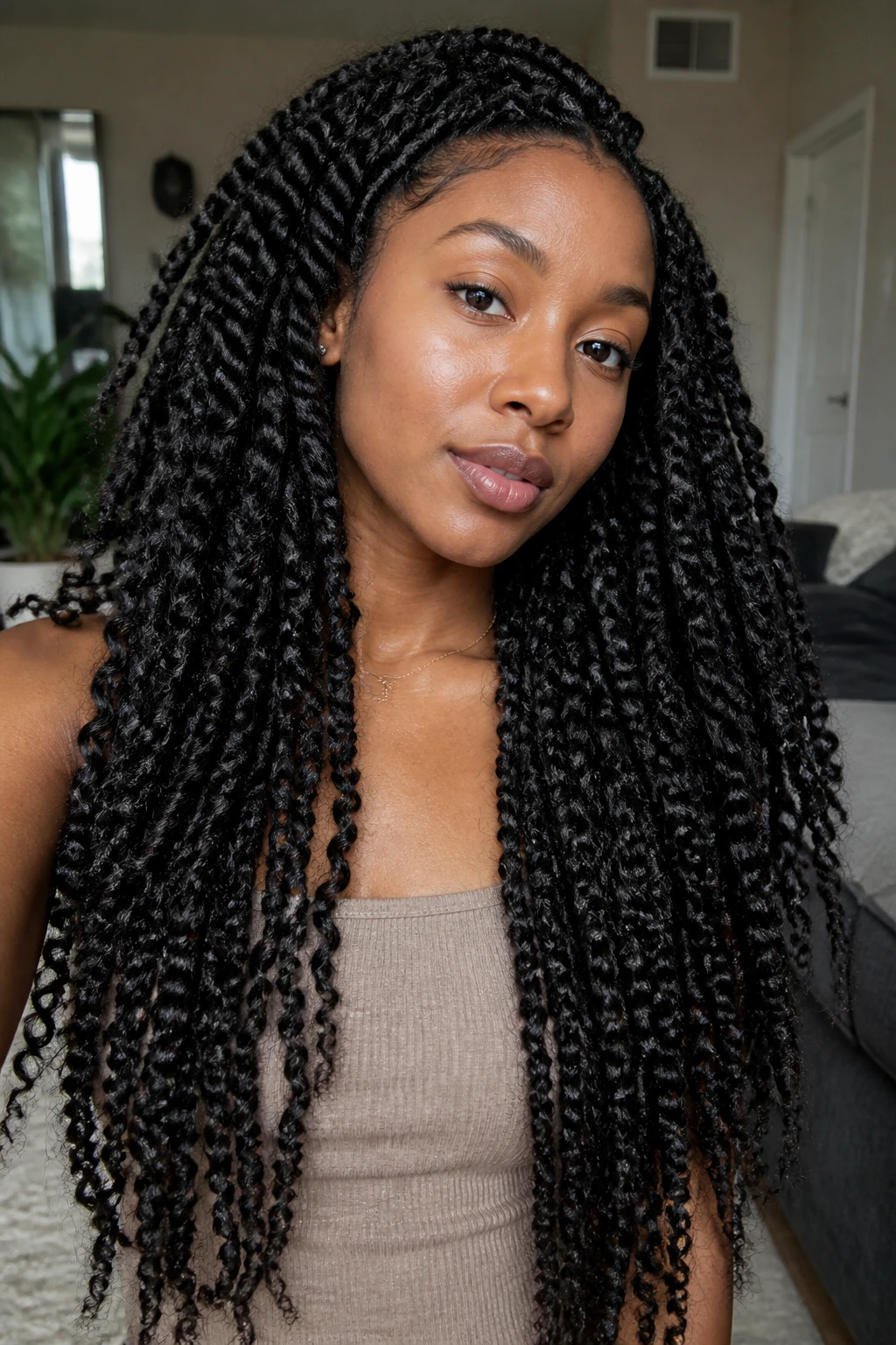 Real person with waist-length twist-out showing defined twists
