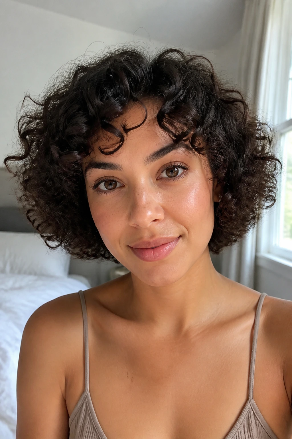 Real woman with rounded curly bob worn for style