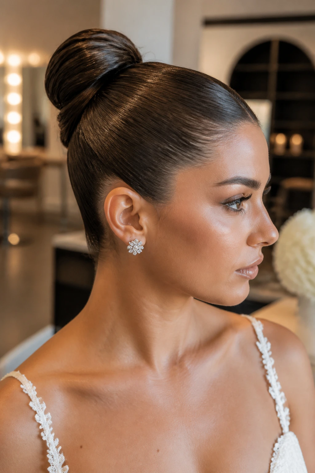 Close-up of a real bride with a glossy wet-look bridal bun
