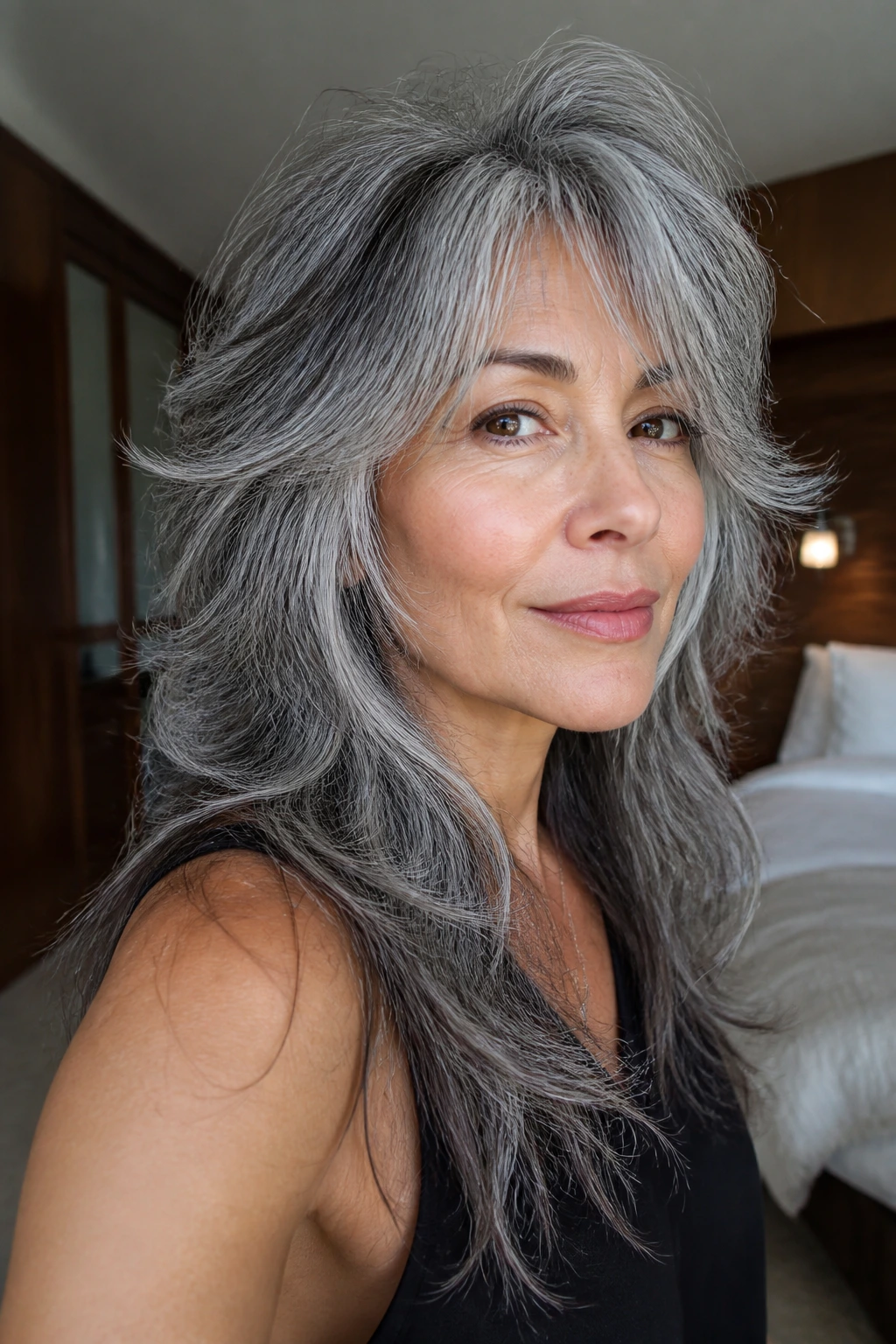Close-up of real person with wolf cut in gray hair