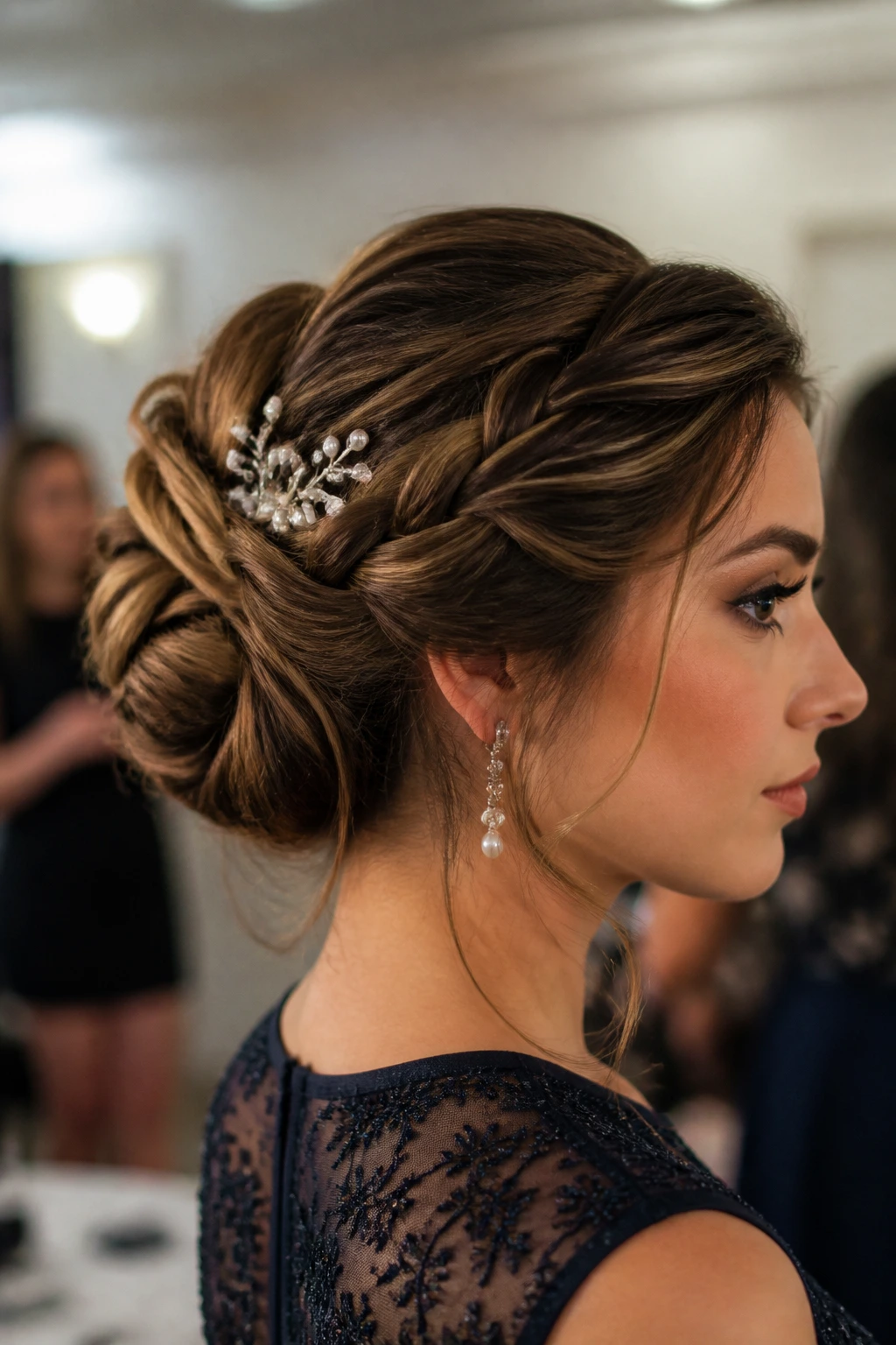 Close-up of a woman with a woven bun and hairpiece